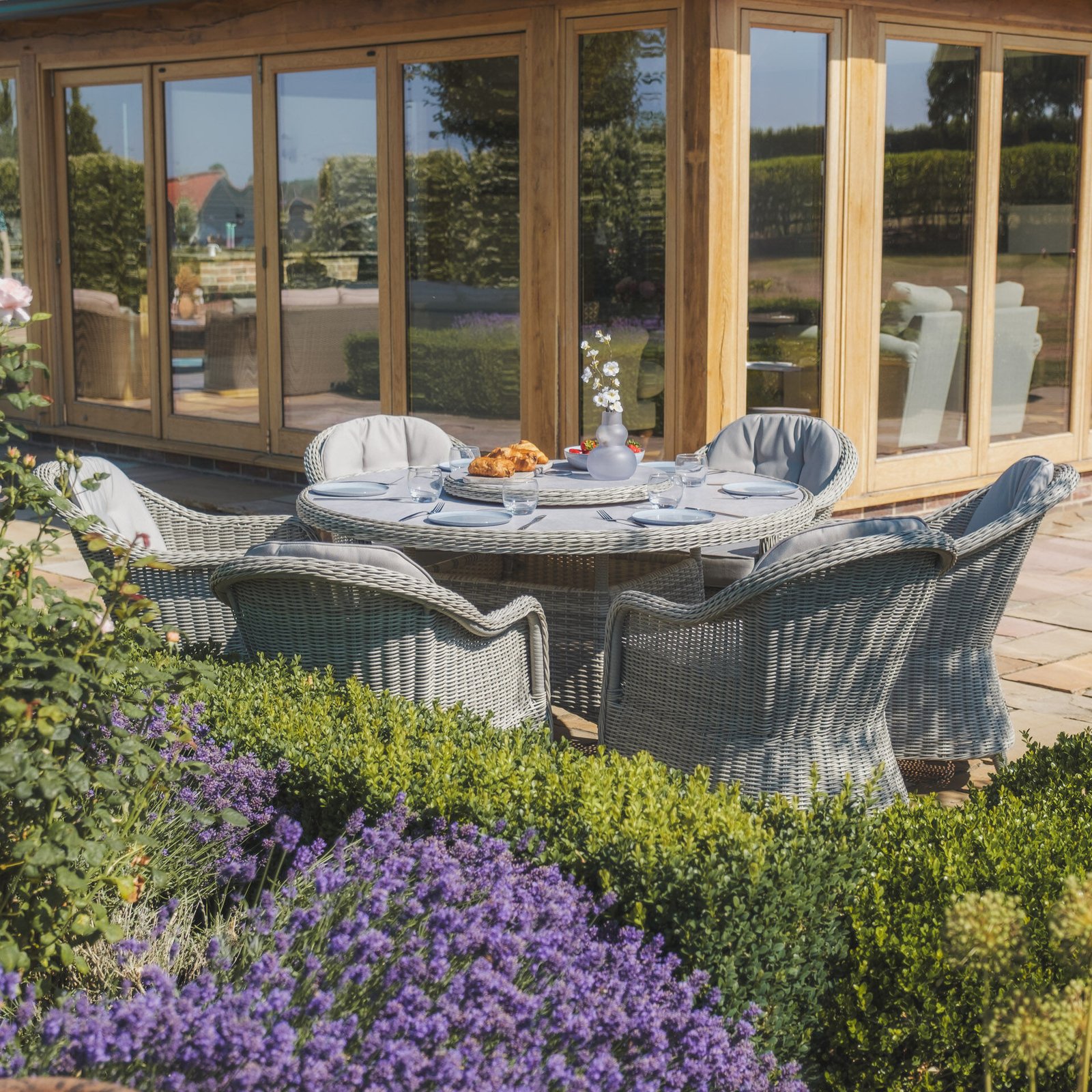A Oxford 6 Seat Round Dining Set with Heritage Dining Chairs & Woven Lazy Susan - Ceramic Glass - Image 3