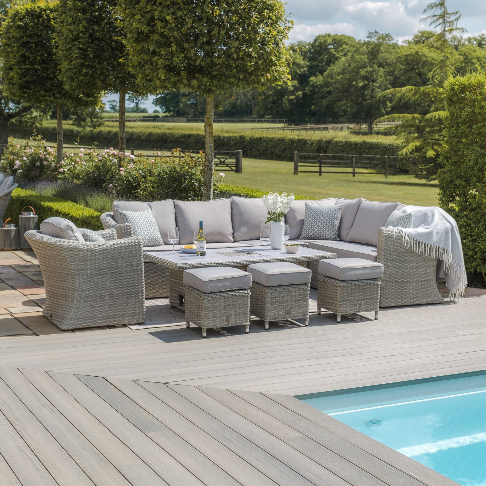 A Oxford Deluxe Large Rattan Corner Dining Set with Rising Table & Armchair - Ceramic Glass - Image 9