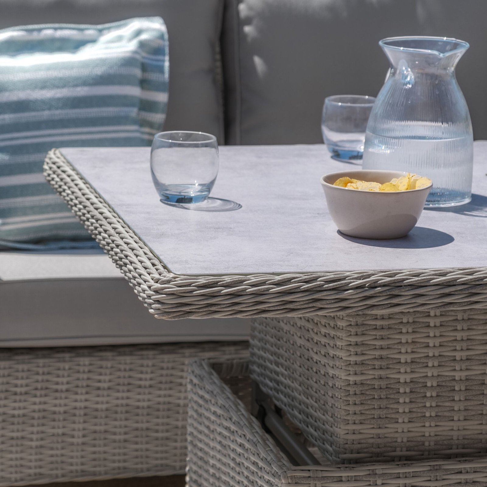 A Oxford Deluxe Large Rattan Corner Dining Set with Rising Table & Armchair - Ceramic Glass - Image 5