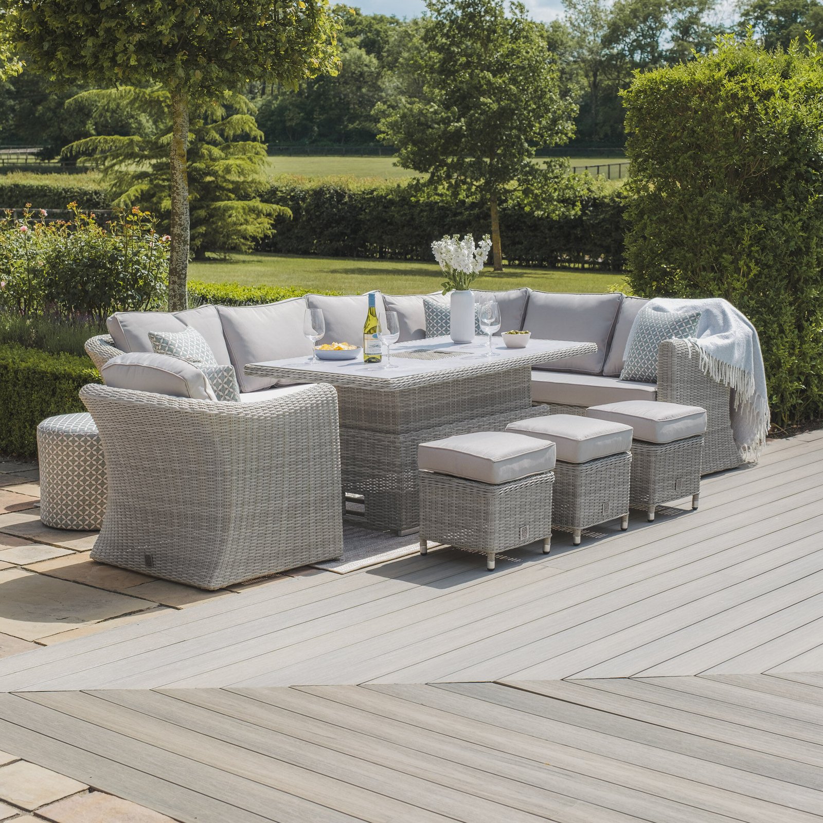 A Oxford Deluxe Large Rattan Corner Dining Set with Rising Table & Armchair - Ceramic Glass - Image 2